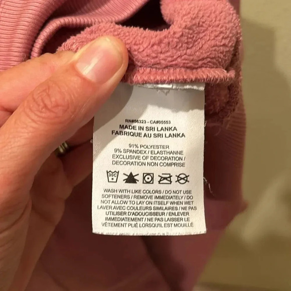 Nike dusty pink hoodie. It has some scrapes on the left side. - Picture 9 of 10